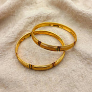 Jhilmil Green Accent Embossed Gold Bangle Set