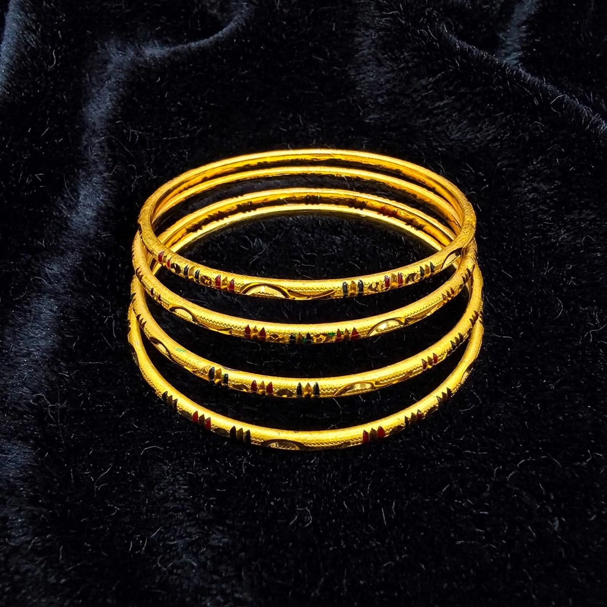 Kasturi Enamel Embossed Gold Bangle Set