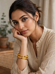 Jhilmil Green Accent Embossed Gold Bangle Set