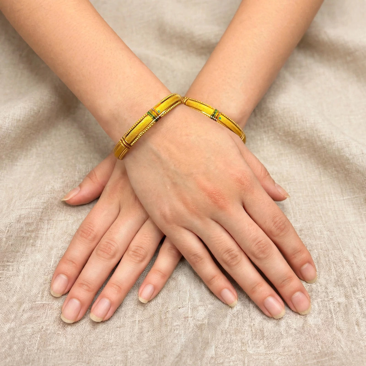 Jhilmil Green Accent Embossed Gold Bangle Set