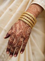 Trupti Woven Gold Bangle Set