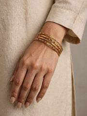 Kasturi Enamel Embossed Gold Bangle Set