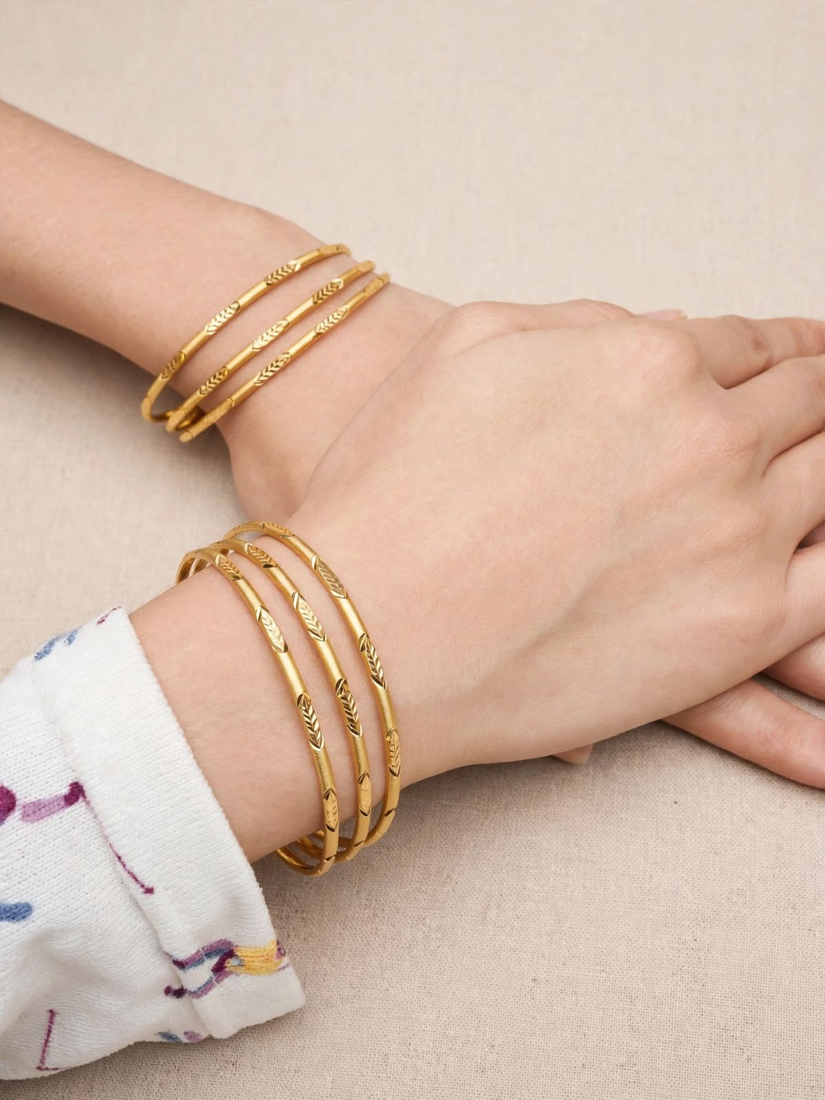 Radhika Leaf Textured Gold Bangle Set