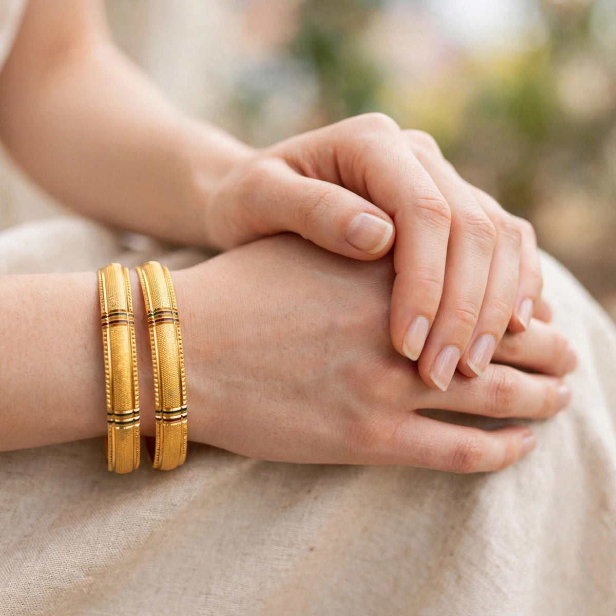 Jhilmil Green Accent Embossed Gold Bangle Set